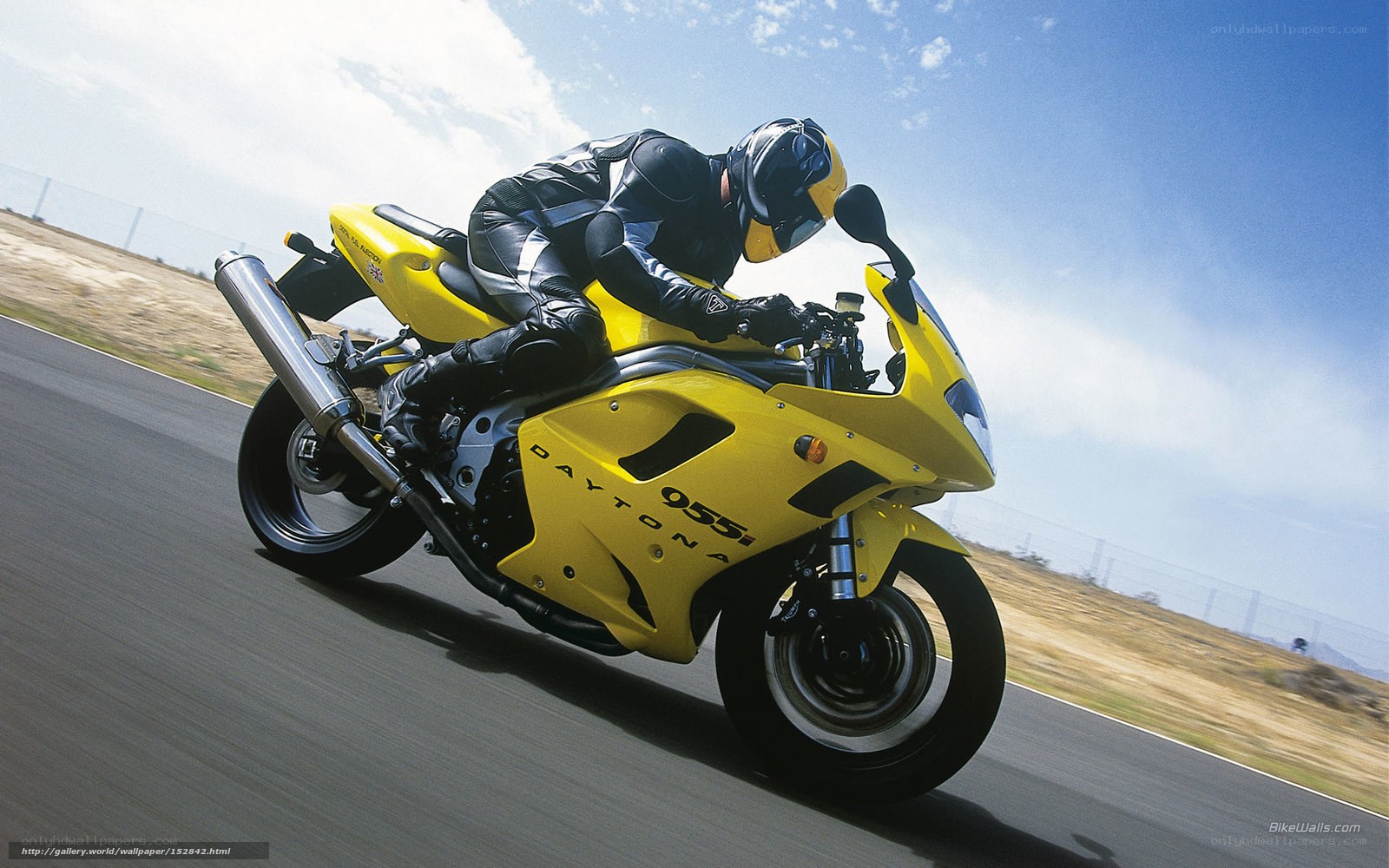 rider on yellow motorcycle