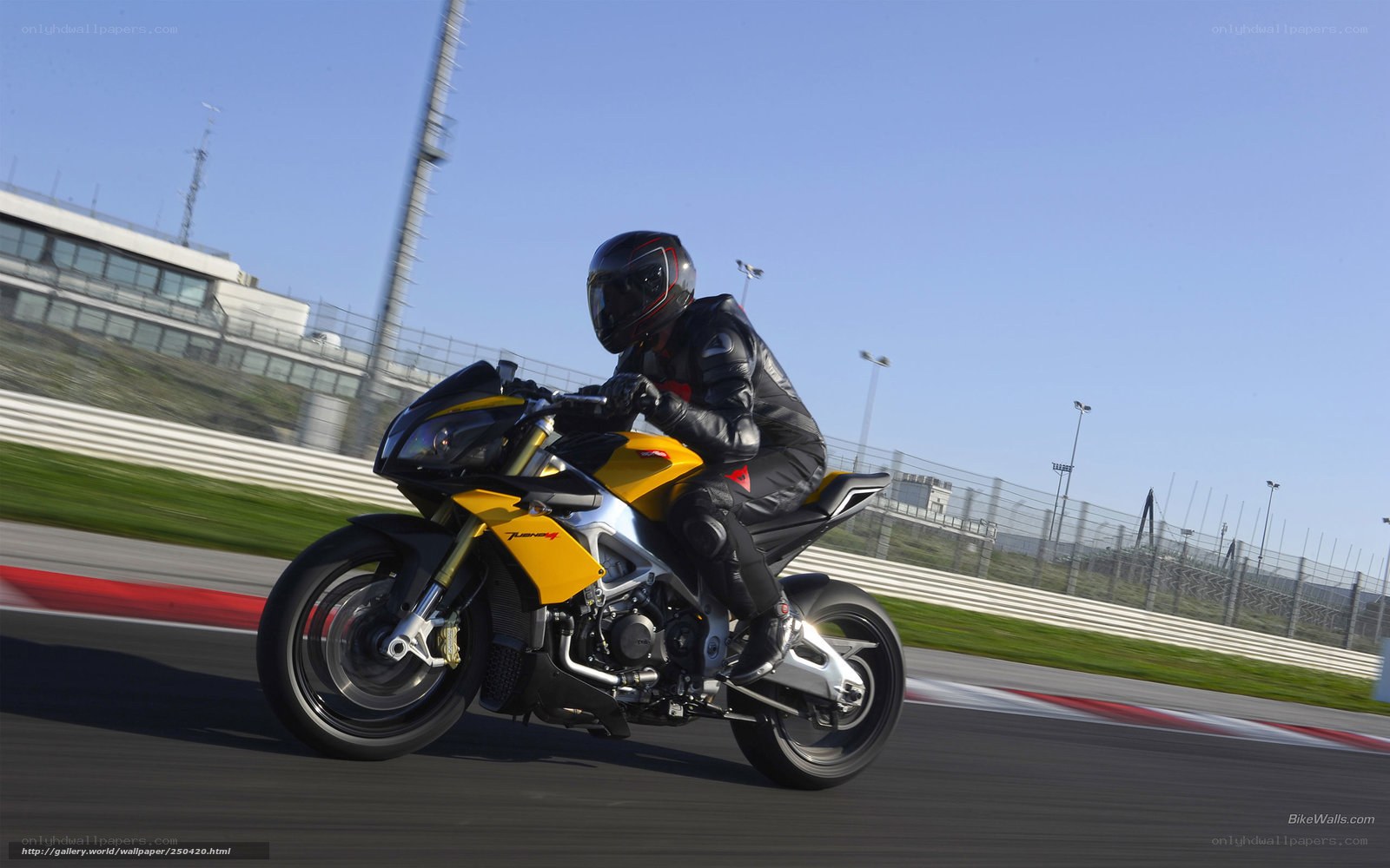 rider on yellow motorcycle