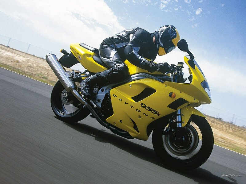 rider on yellow motorcycle