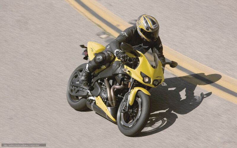 rider on yellow motorcycle