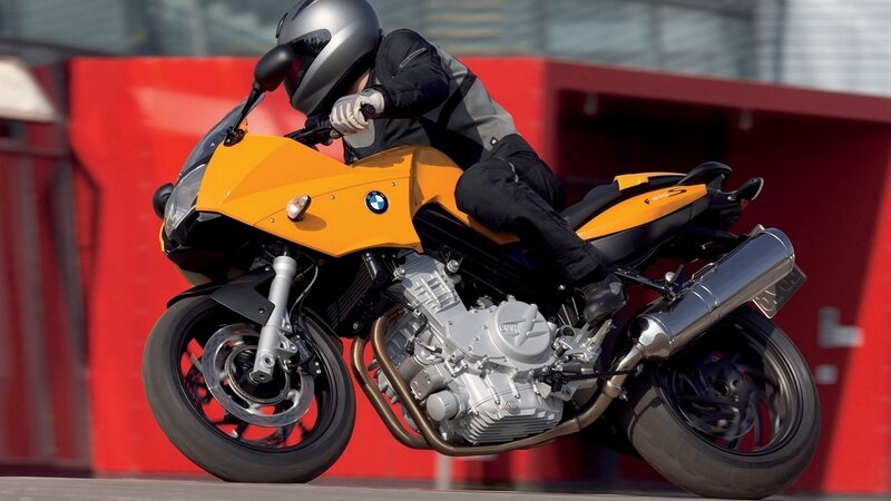 rider on yellow motorcycle