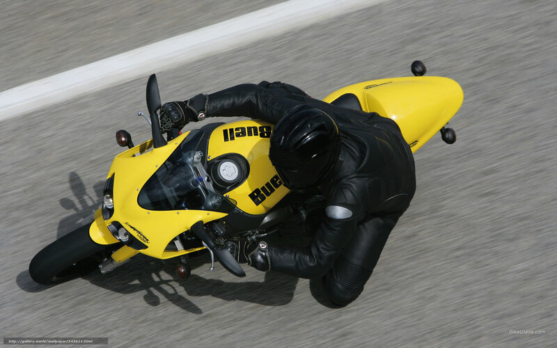 rider on yellow motorcycle