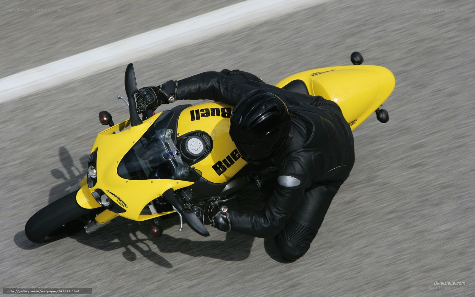 rider on yellow motorcycle