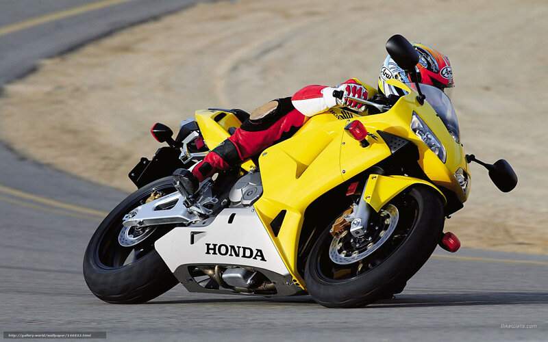 Rider on Yellow Motorcycle — Dynamic