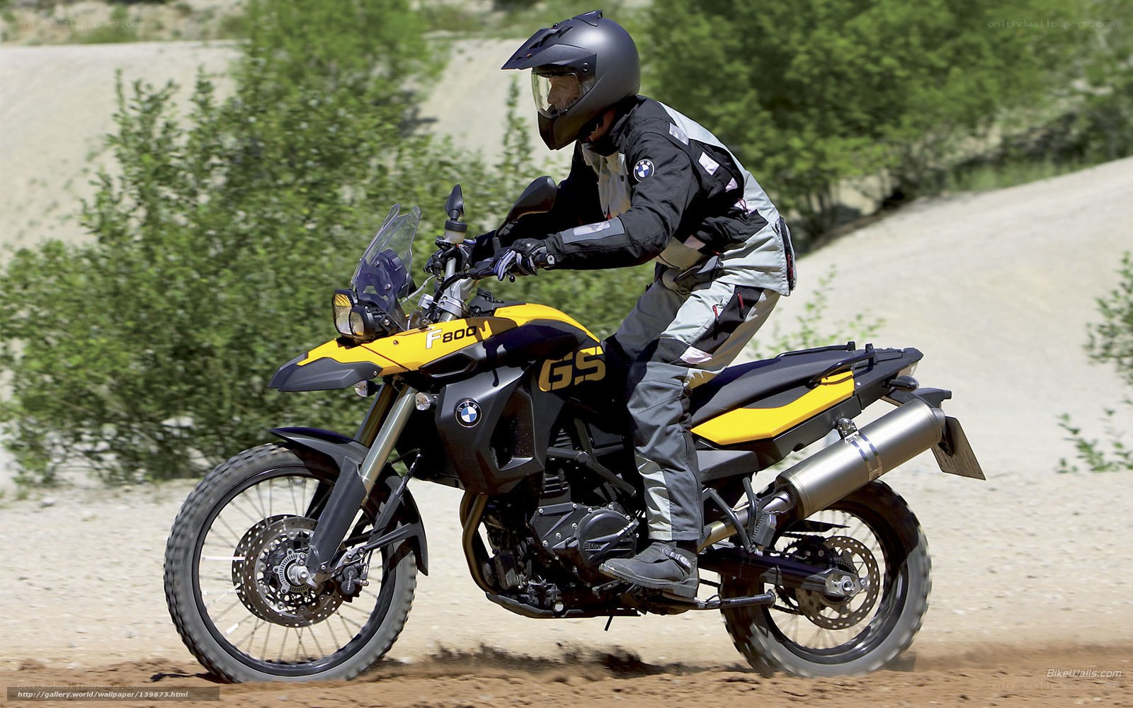rider on yellow motorcycle