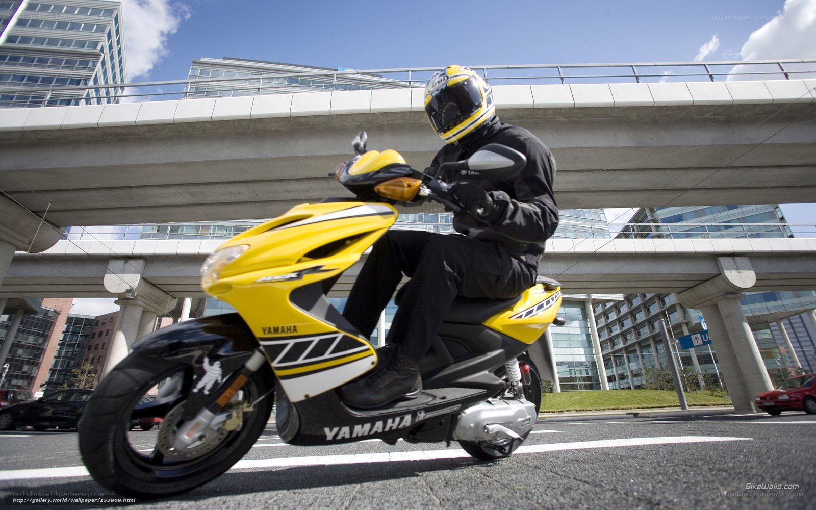 Rider on yellow scooter