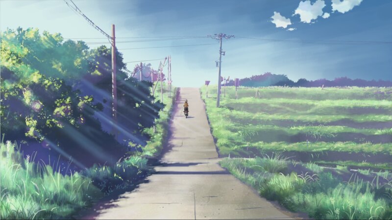 Riding a motorcycle on a rural road
