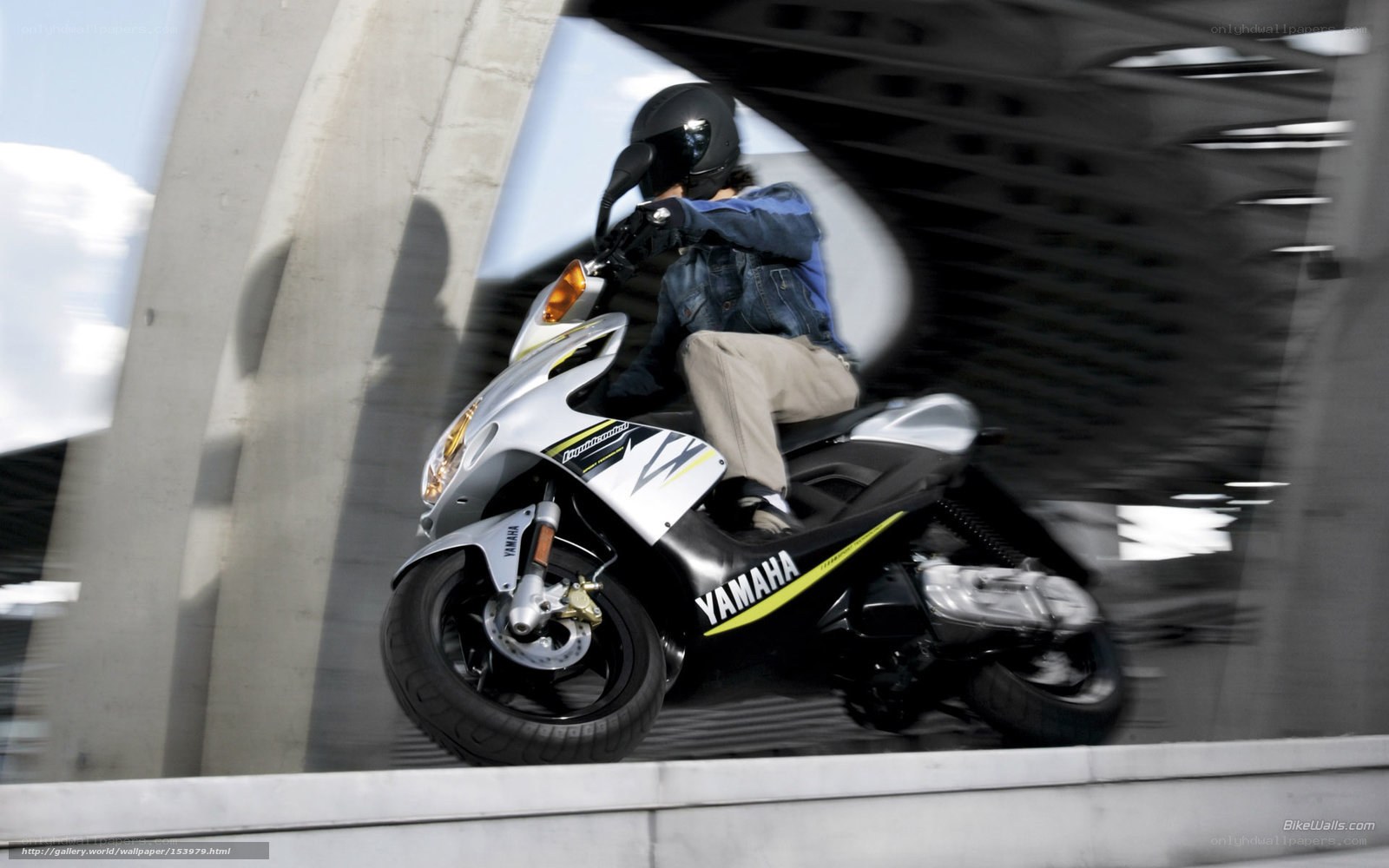 Riding a Yamaha scooter