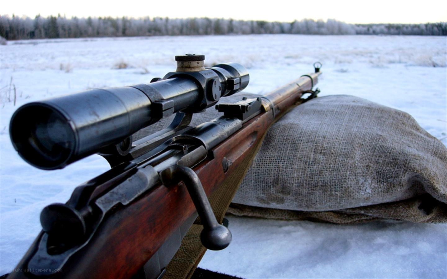 rifle in snowy field