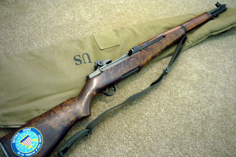rifle on a bag