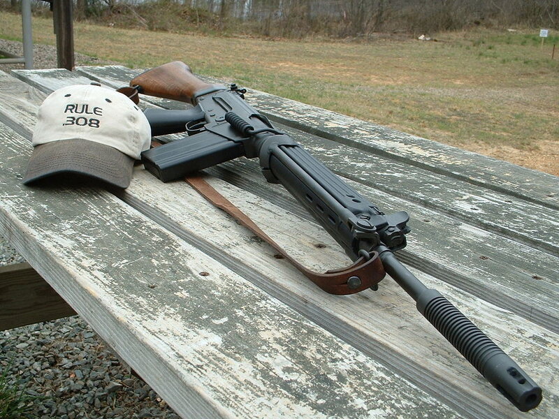 rifle on picnic table