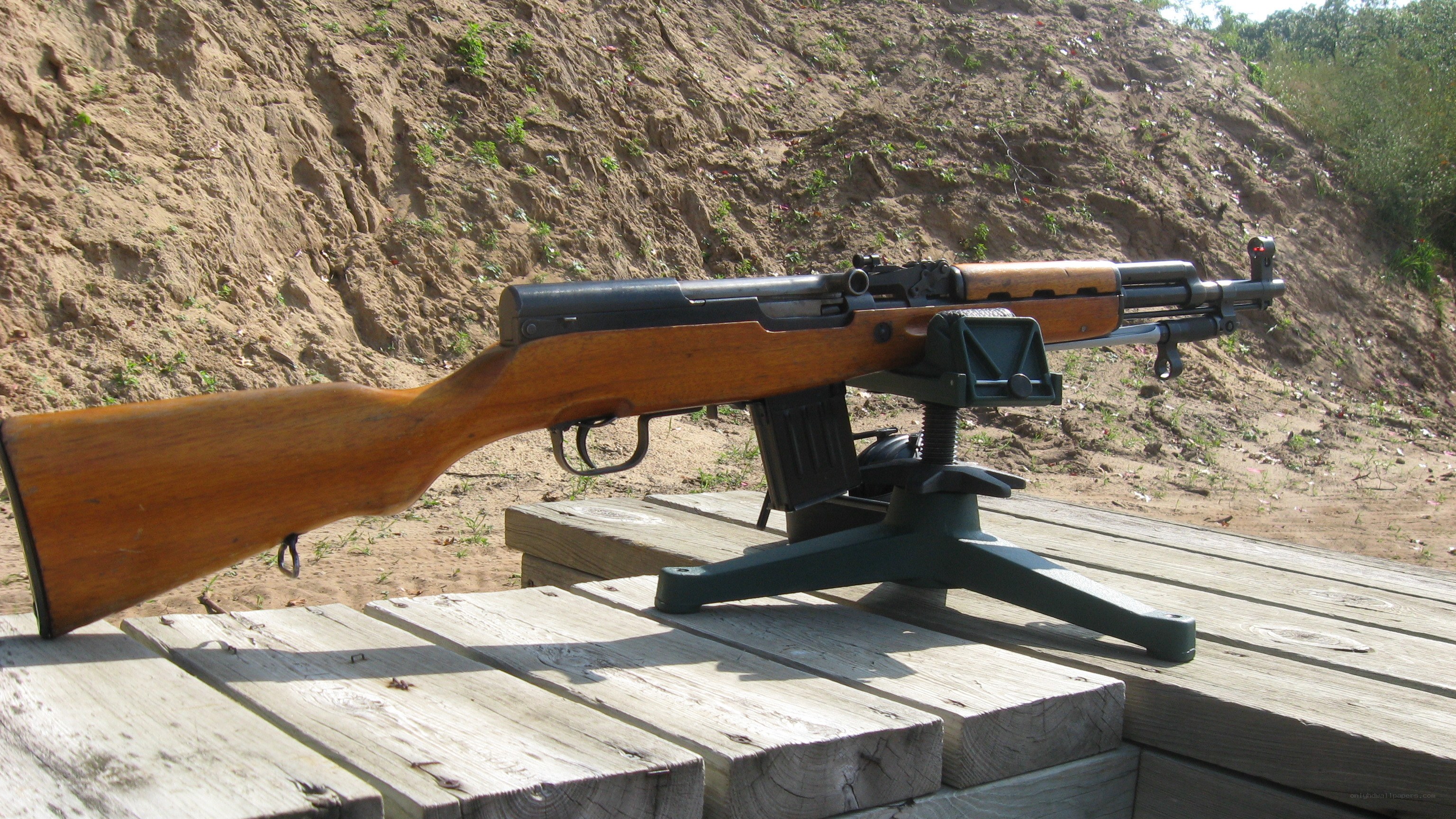 rifle on shooting stand