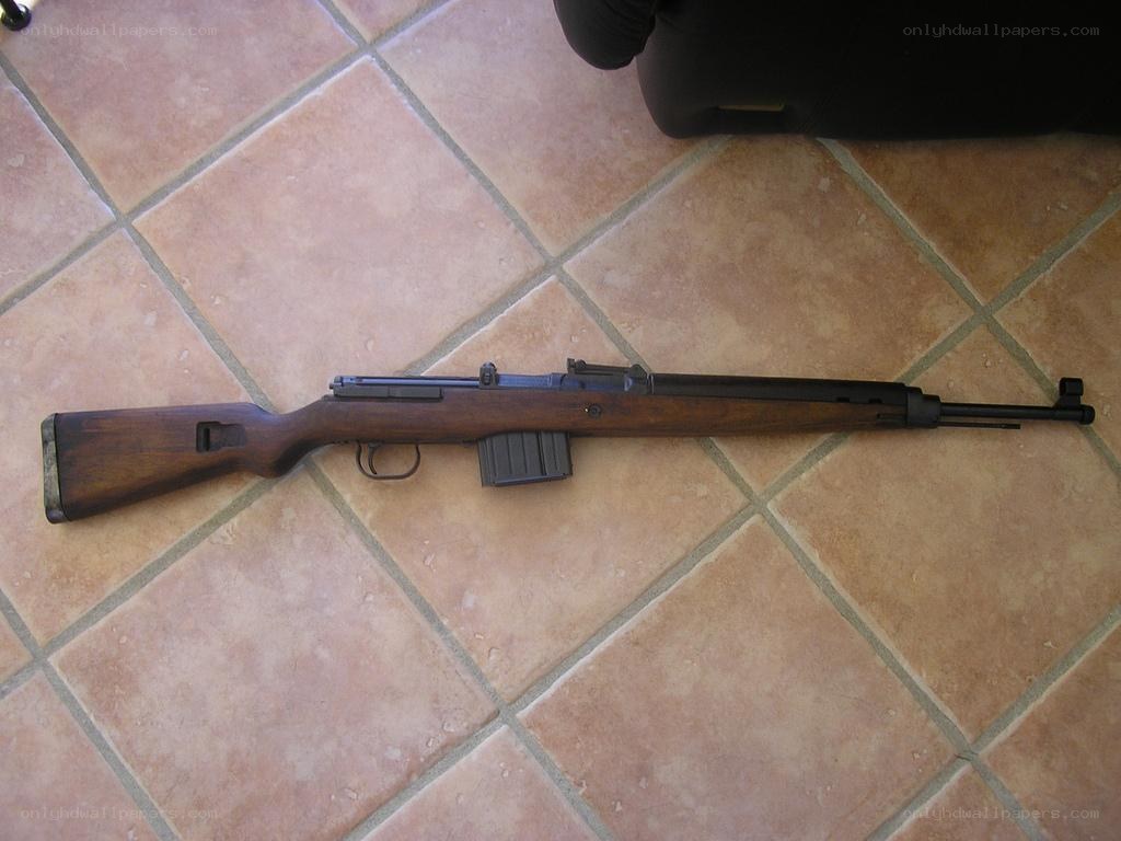 rifle on tiled floor