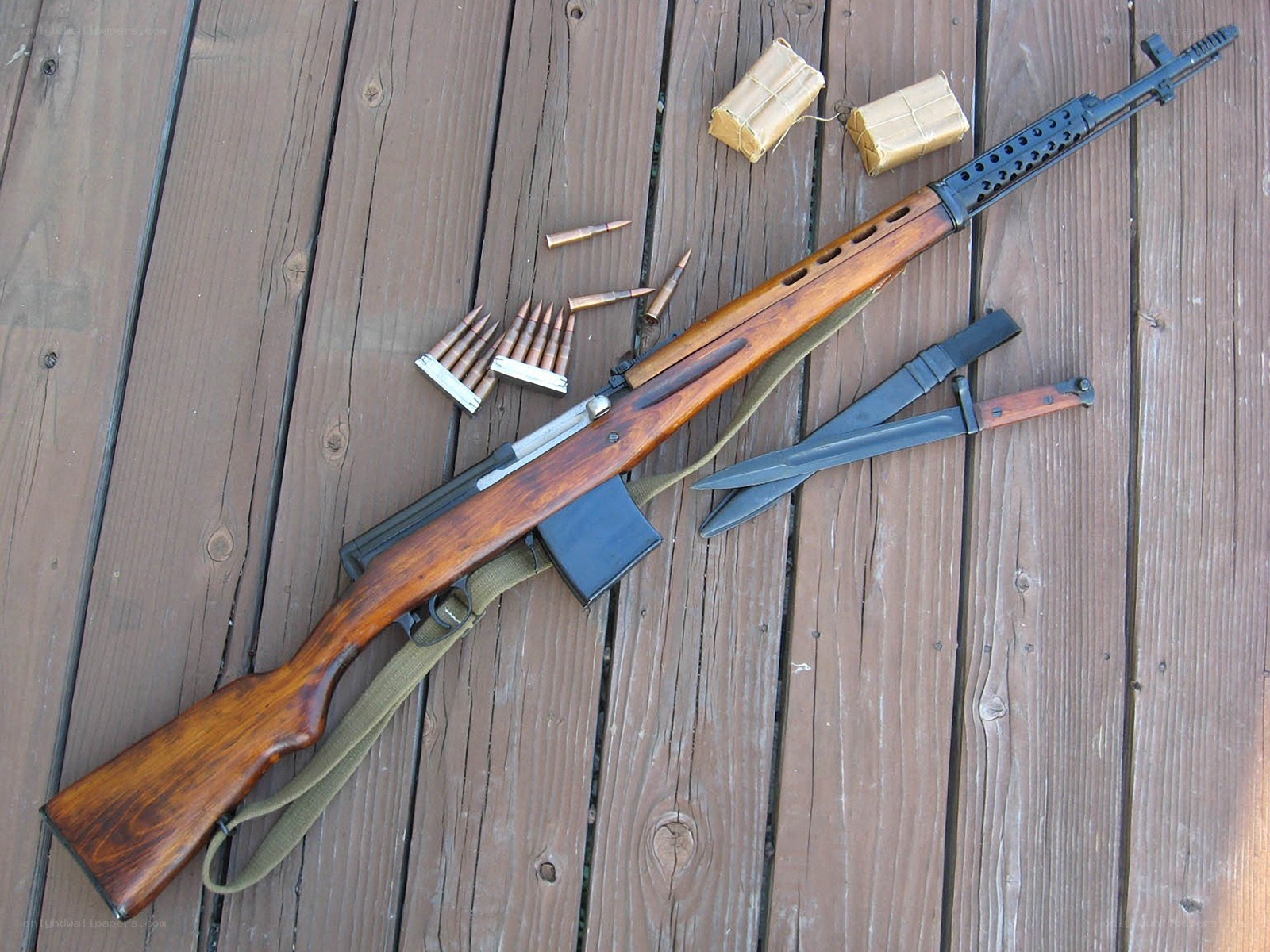 rifle with ammunition and bayonet
