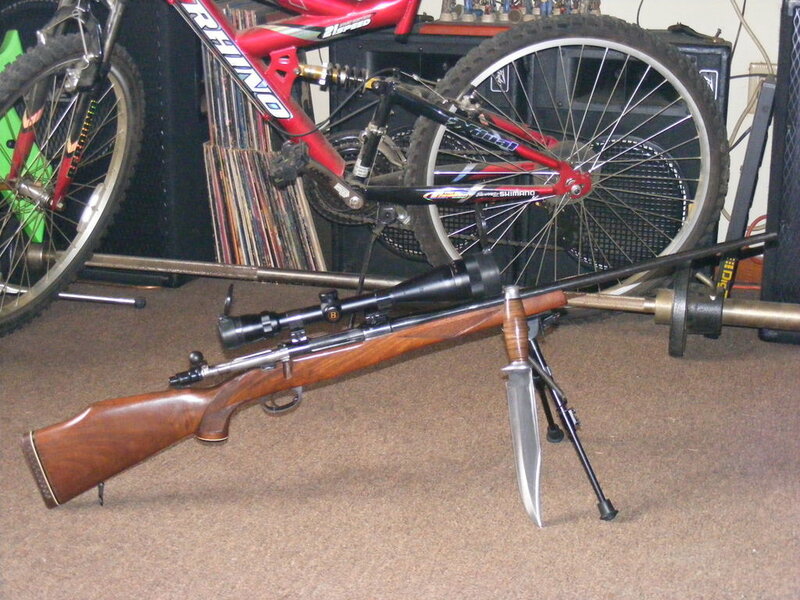 Rifle with scope and knife