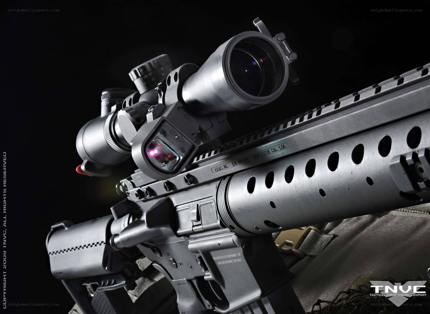 rifle with scope and laser