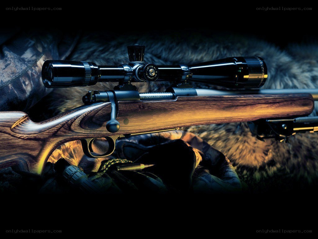 Rifle with scope on fur