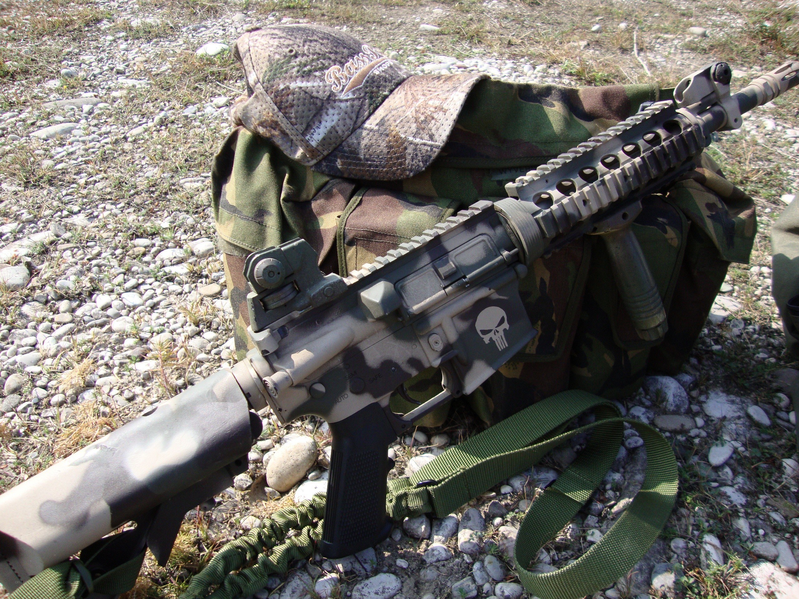 rifle with skull emblem