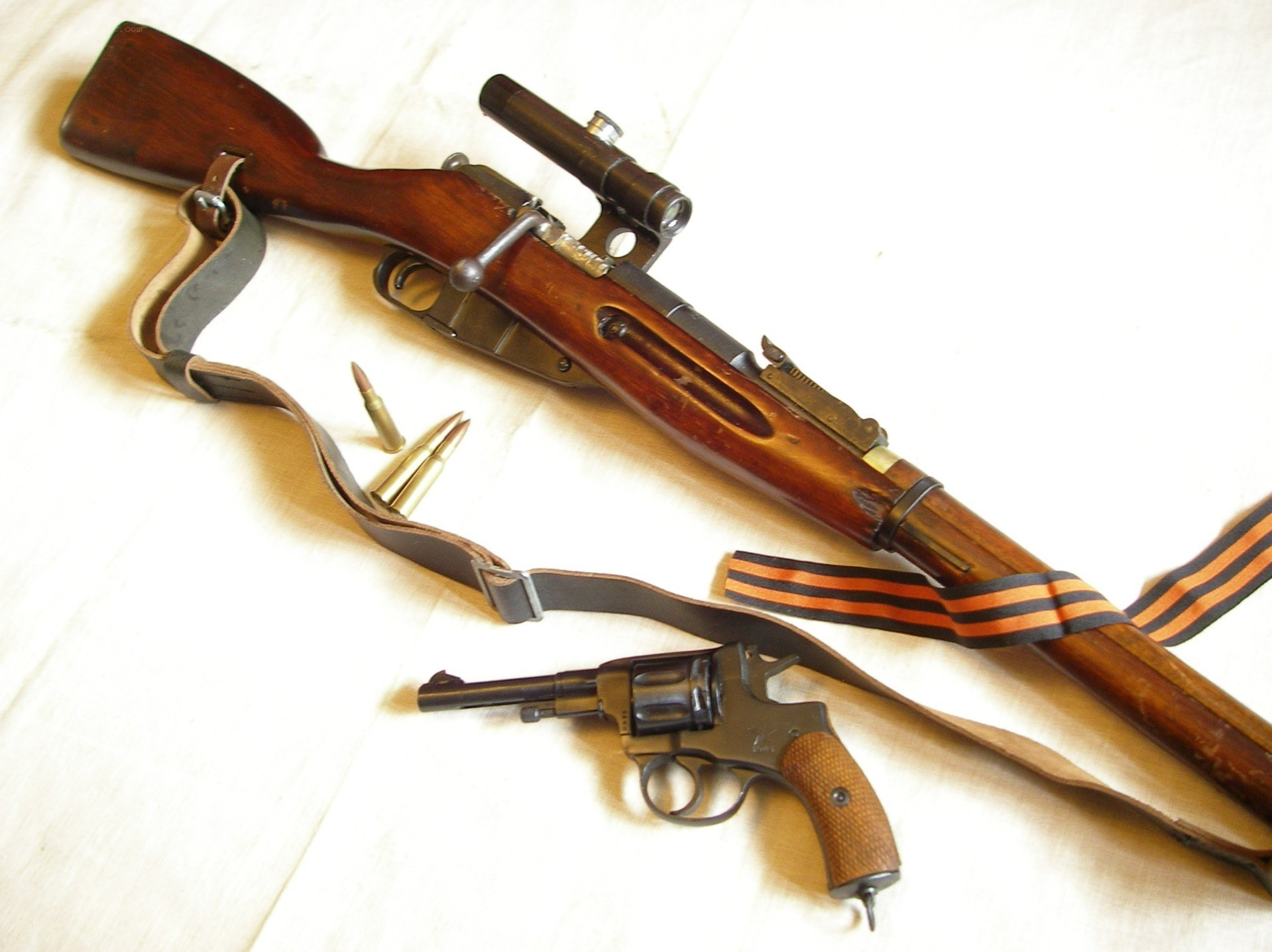 Rifles and revolver on display