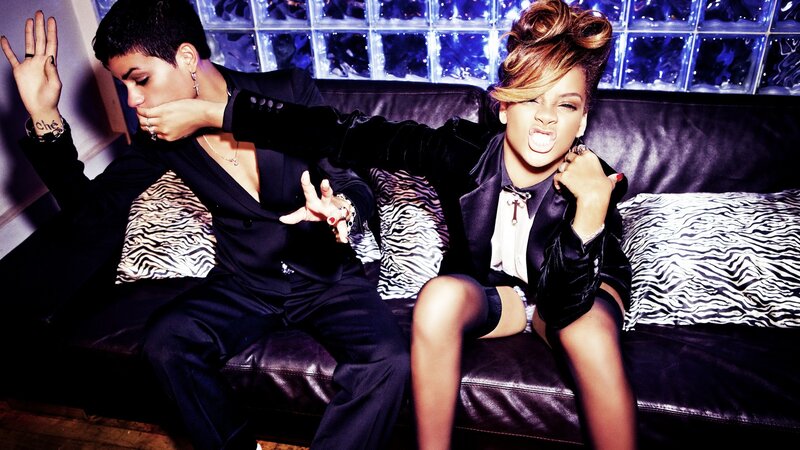 Rihanna and a friend on a couch