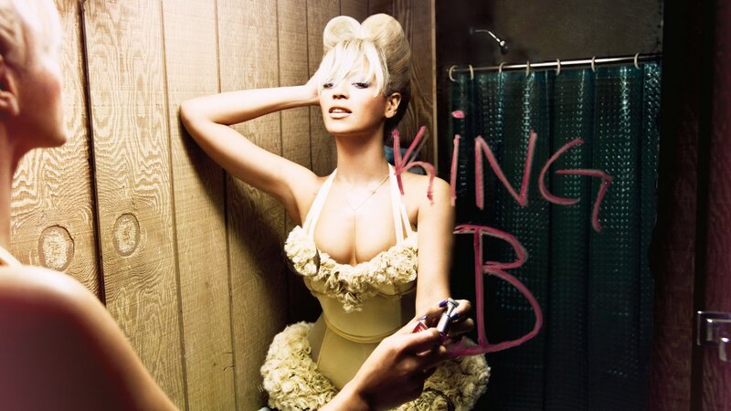 Rihanna in a bathroom mirror