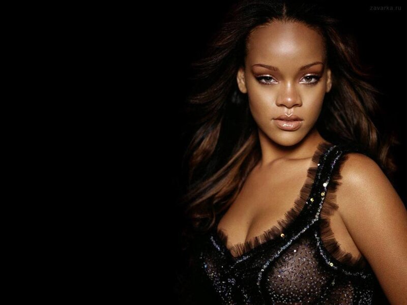 Rihanna in a black dress