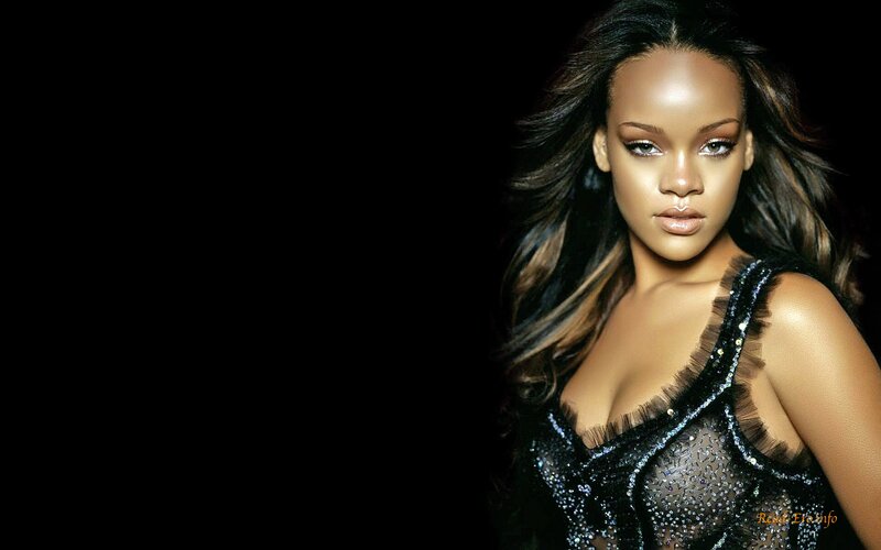 Rihanna in a black dress