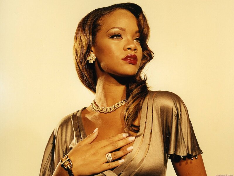 Rihanna in gold dress