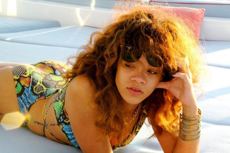 Rihanna in snake-print swimsuit