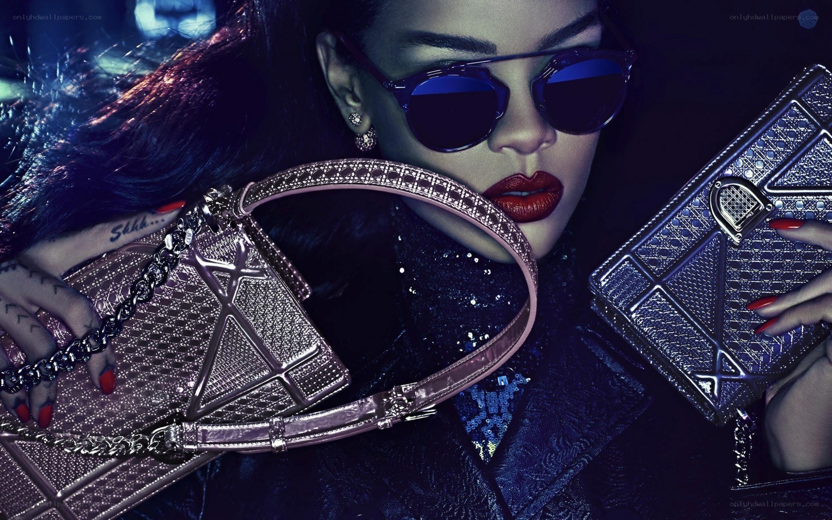 Rihanna with luxury handbags