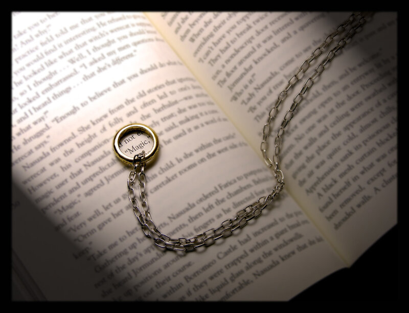 Ring Necklace on Book