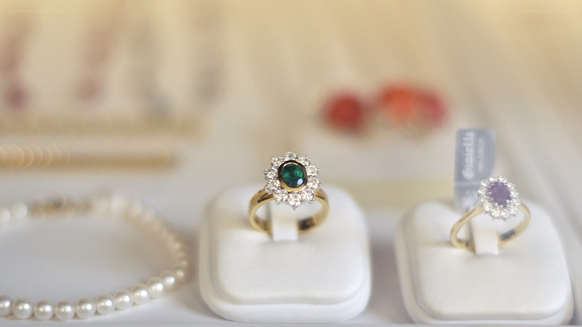 rings and pearls on display