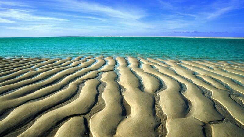 Rippled Sand on Beach — Blue