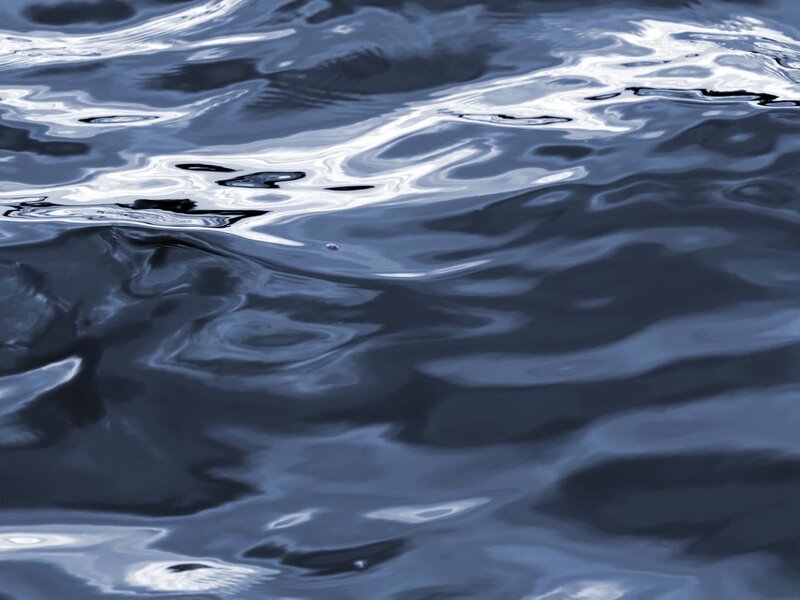 Ripples on a blue water surface