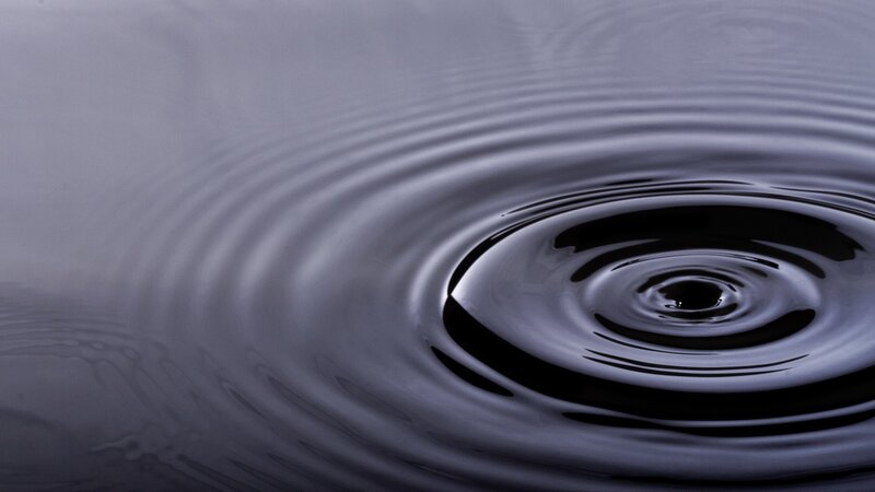 Ripples on a dark water surface