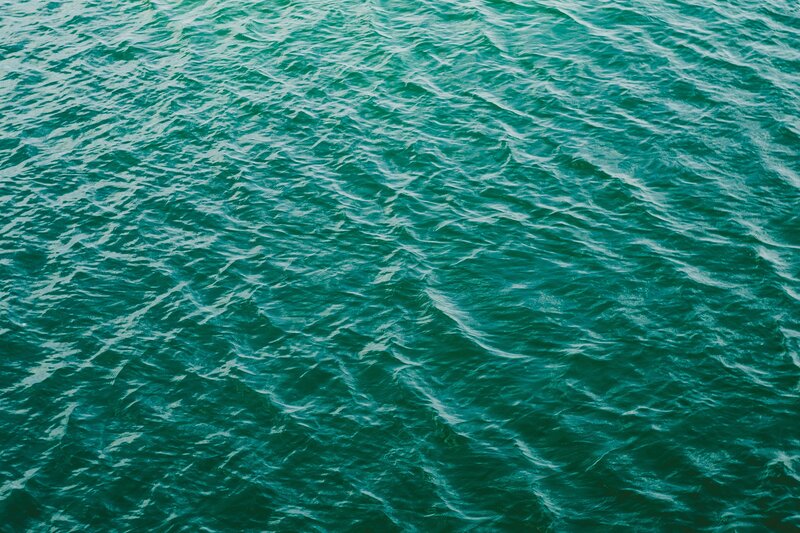 rippling teal water surface