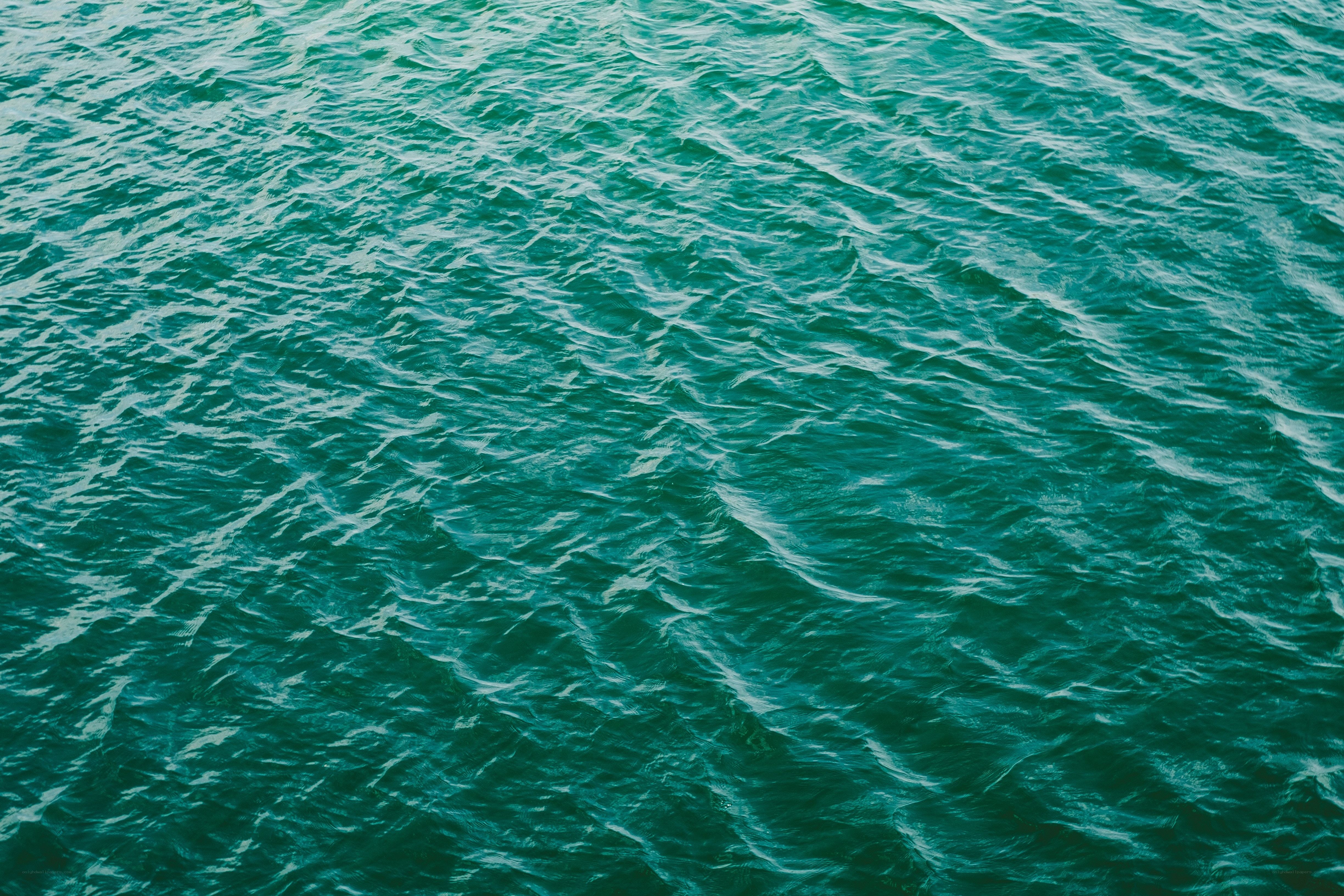 rippling teal water surface