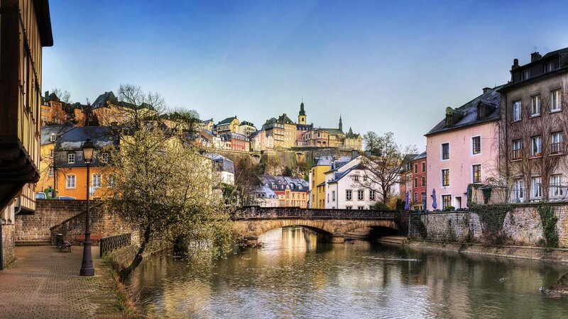 River and Bridge in City — Blue