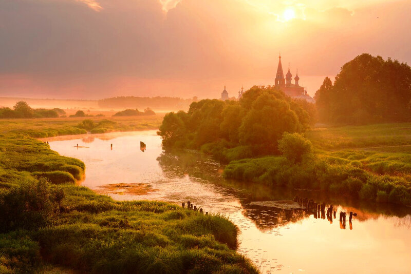 River and Church at Sunrise