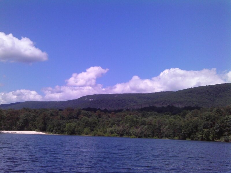 River and Forested Hills — Blue