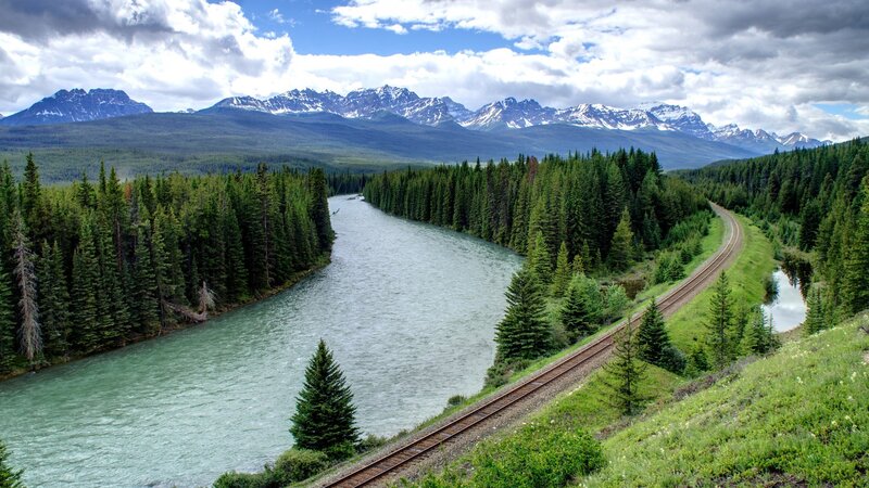 River and Railway in Mountains
