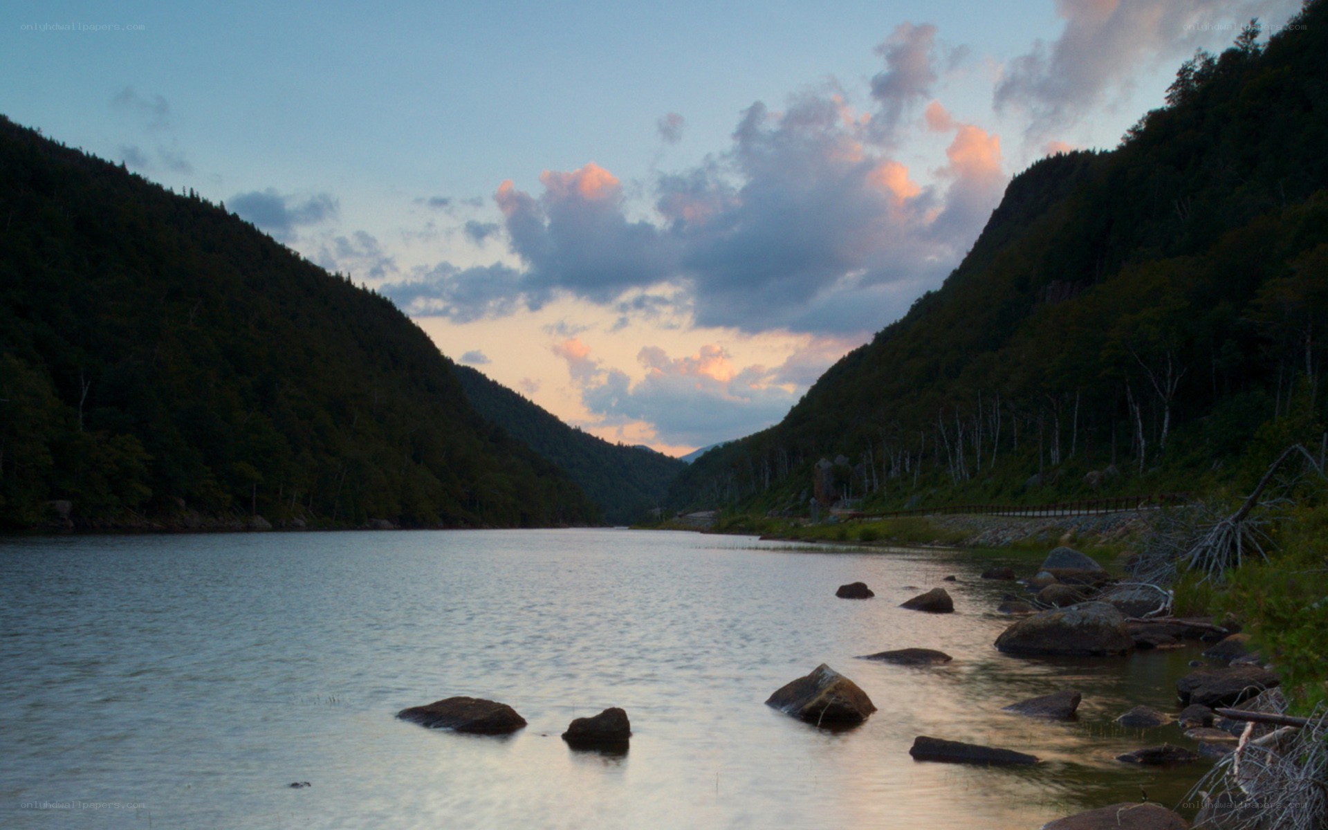 river at dusk between mountains