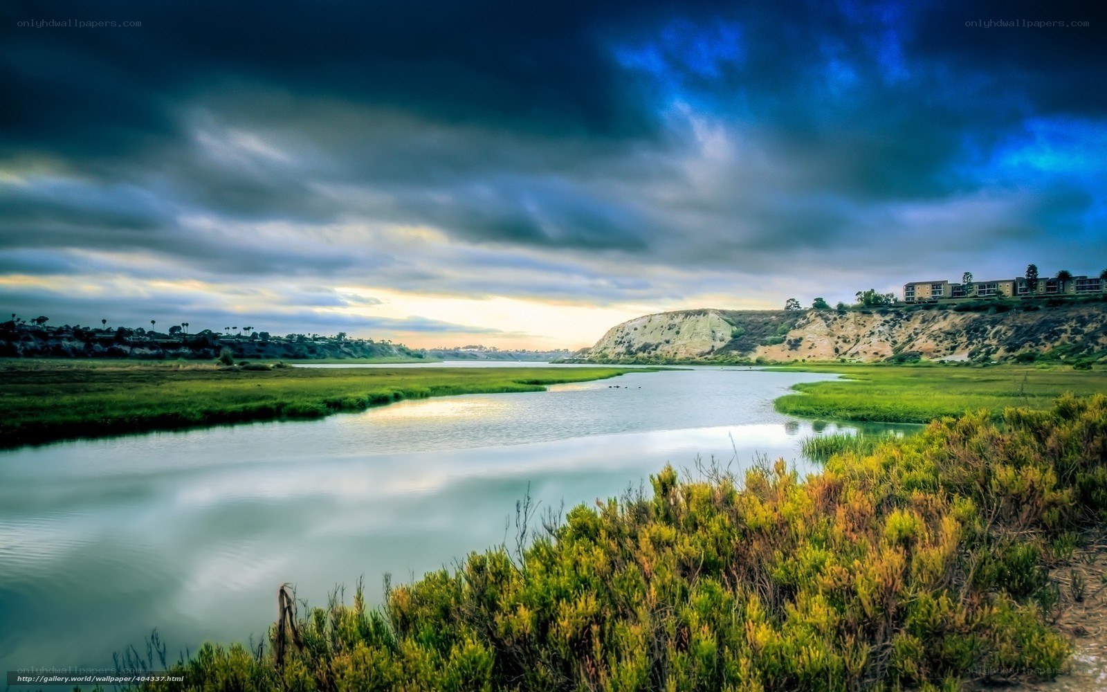 River at dusk with dramatic sky