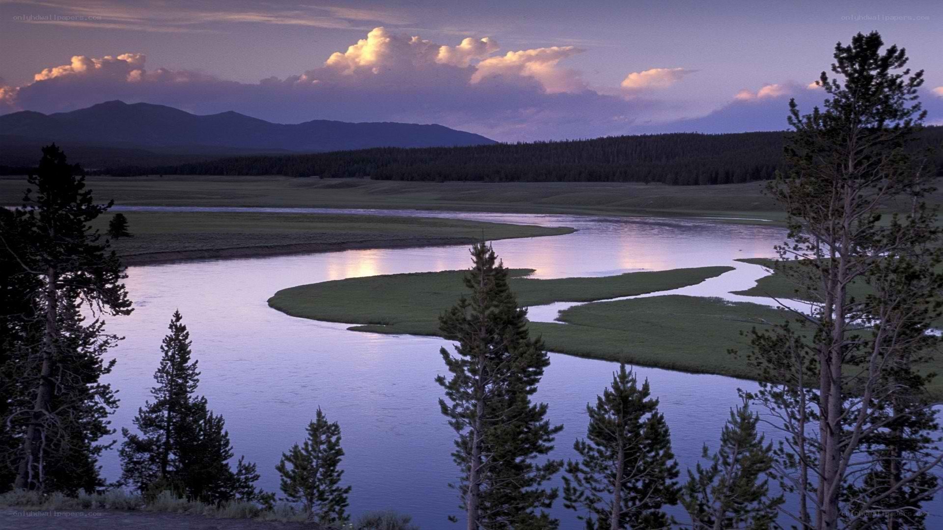 river at dusk with mountains