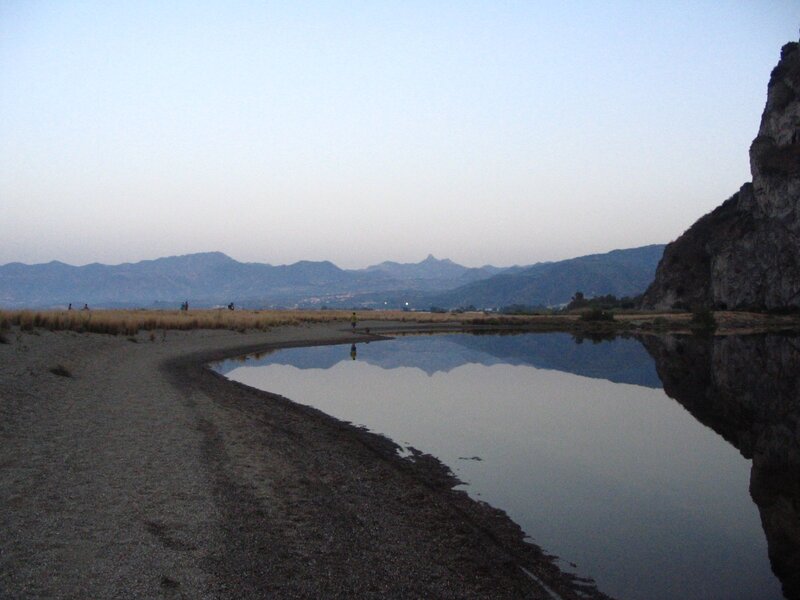 river at dusk with mountains