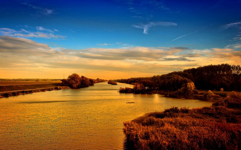River at Sunset — Blue, Serene, Photograph, Trees, Sky, Clouds