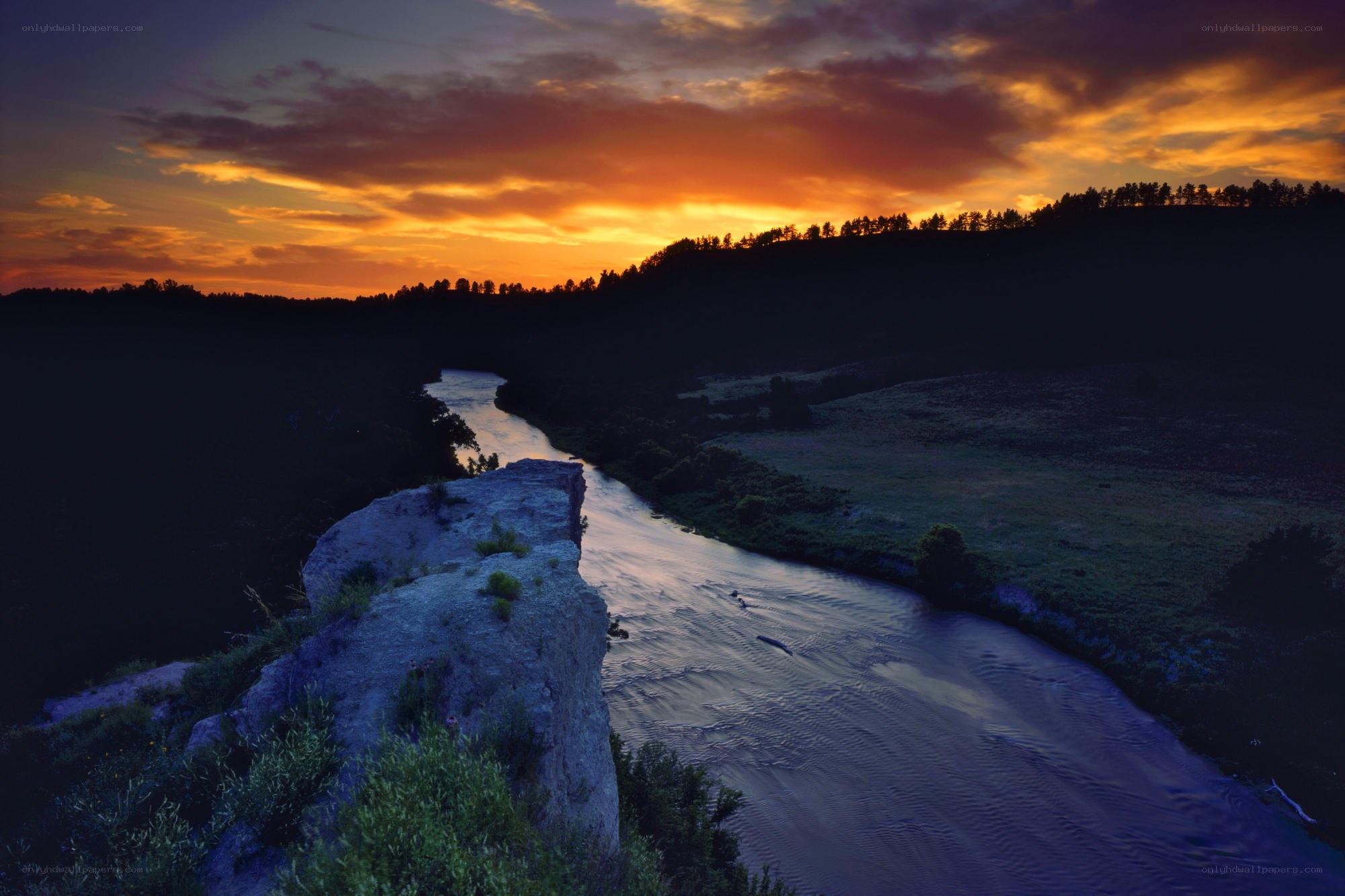 River at sunset in a valley