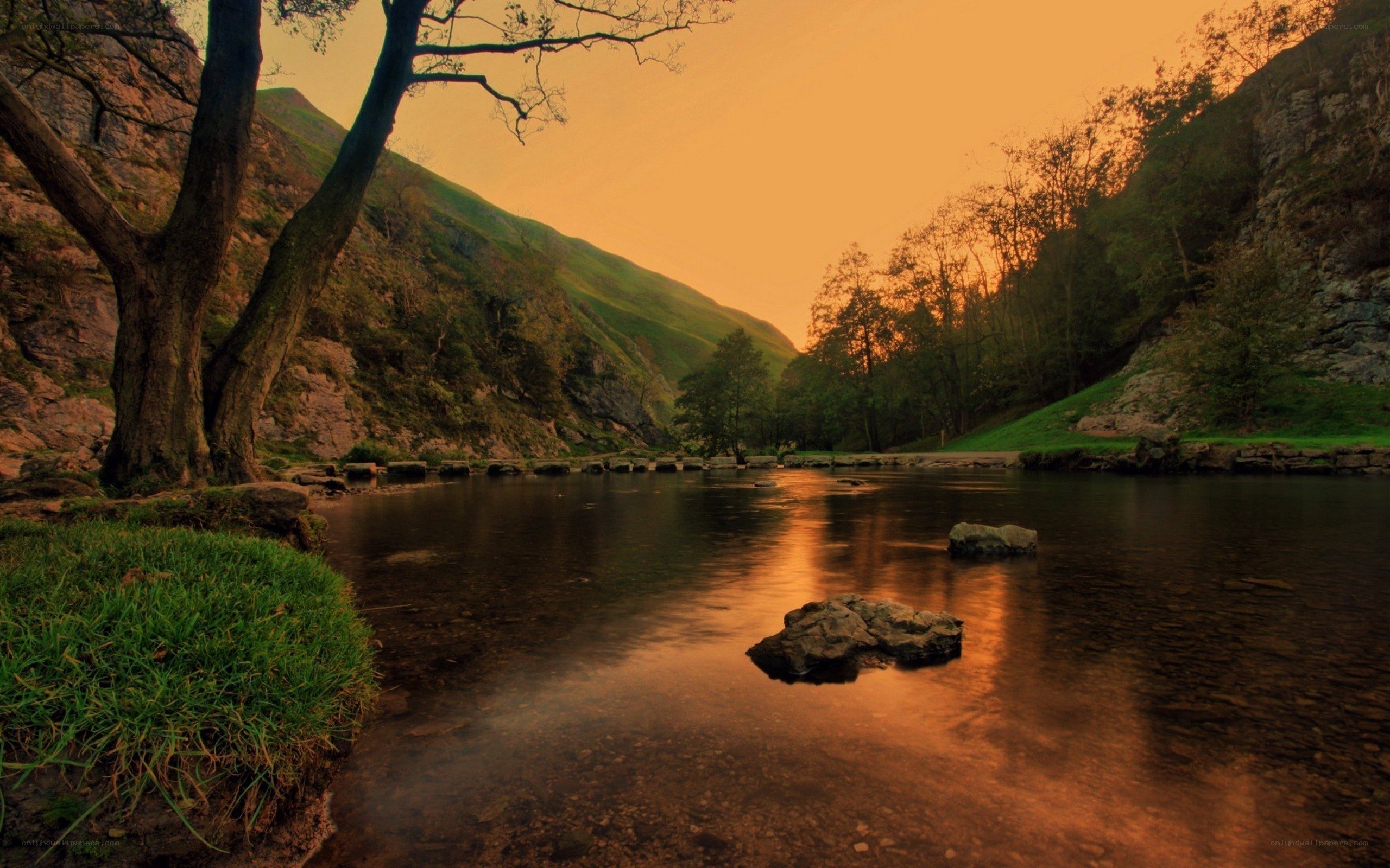 River at sunset in a valley