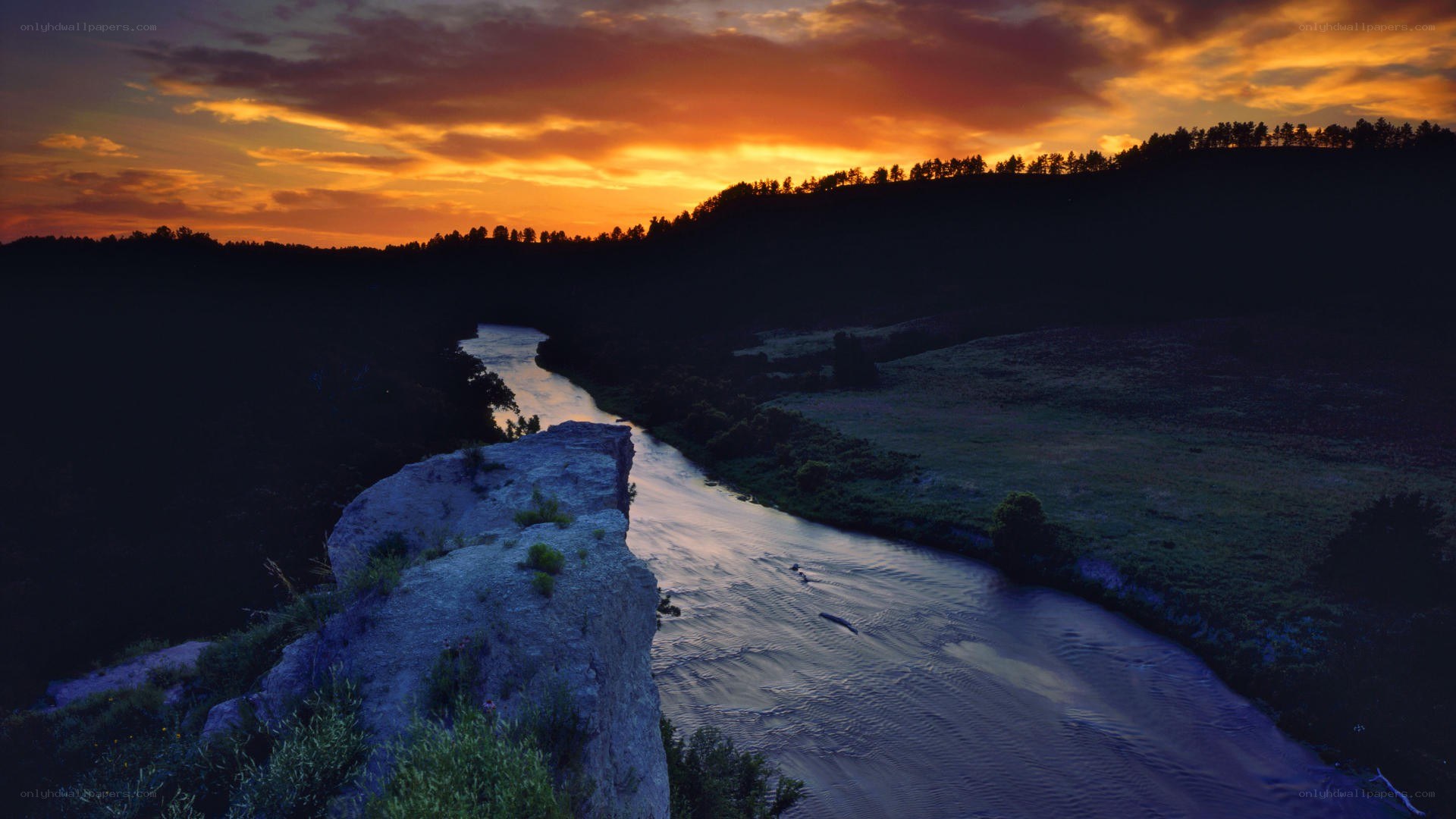 River at sunset in a valley