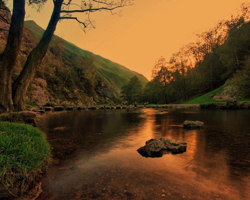 River at sunset in a valley